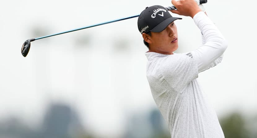 Wenyi Ding watches his tee shot on the eighth hole during the first round of the U.S. Open golf tournament at Los Angeles Country Club on Thursday, June 15, 2023, in Los Angeles. (AP Photo/Lindsey Wasson)