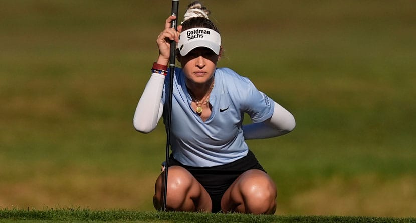 Nelly Korda, of the United States, lines up a putt on the first hole during the final round of the LPGA Kroger Queen City Championship golf tournament at TPC River's Bend in Maineville, Ohio, Sunday, Sept. 22, 2024. (AP Photo/Carolyn Kaster)