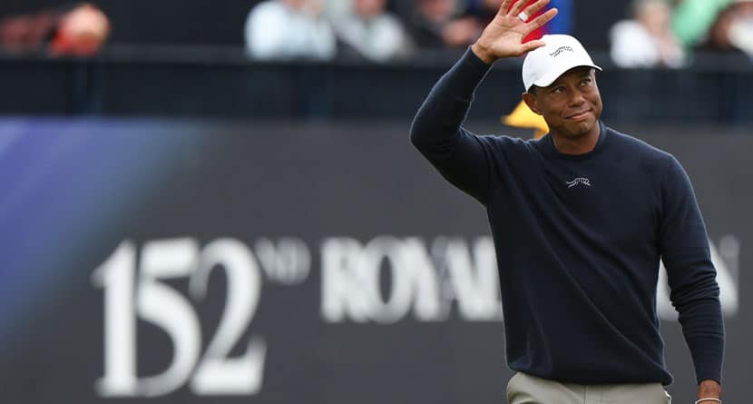 Tiger Woods of the United States waves as he walks off the 18th green following his second round of the British Open Golf Championships at Royal Troon golf club in Troon, Scotland, Friday, July 19, 2024. (AP Photo/Scott Heppell)