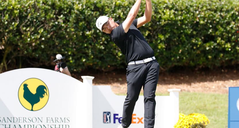 Kevin Yu watches his ball after teeing off from the first hole during the fourth round of the 2024 Sanderson Farms Championship at the Country Club of Jackson on Oct. 06, 2024, in Jackson, Miss. (AP Photo/Sarah Warnock).