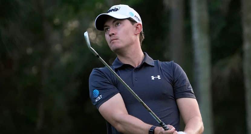 Maverick McNealy watches his tee shot on the 8th hole during the first round of The Players Championship golf tournament Thursday, March 14, 2024, in Ponte Vedra Beach, Fla. (AP Photo/Marta Lavandier)