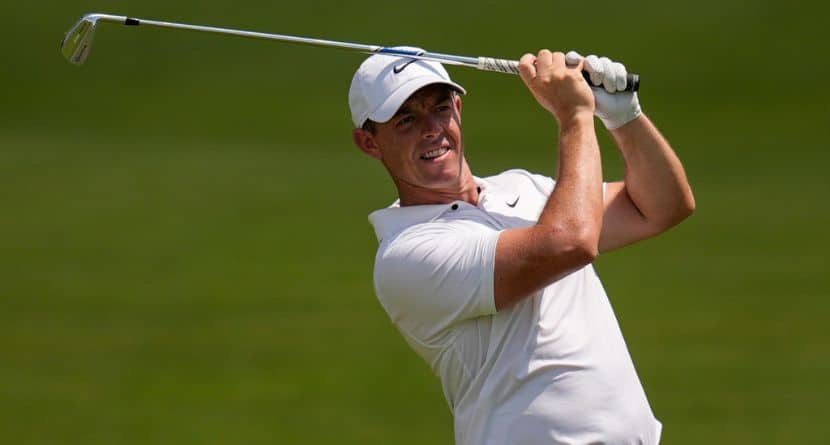 Rory McIlroy, of Northern Ireland, hits out of the seventh fairway during the second round of the Tour Championship golf tournament, Friday, Aug. 30, 2024, in Atlanta. (AP Photo/Mike Stewart)