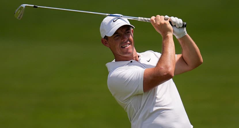 Rory McIlroy, of Northern Ireland, hits out of the seventh fairway during the second round of the Tour Championship golf tournament, Friday, Aug. 30, 2024, in Atlanta. (AP Photo/Mike Stewart, File)