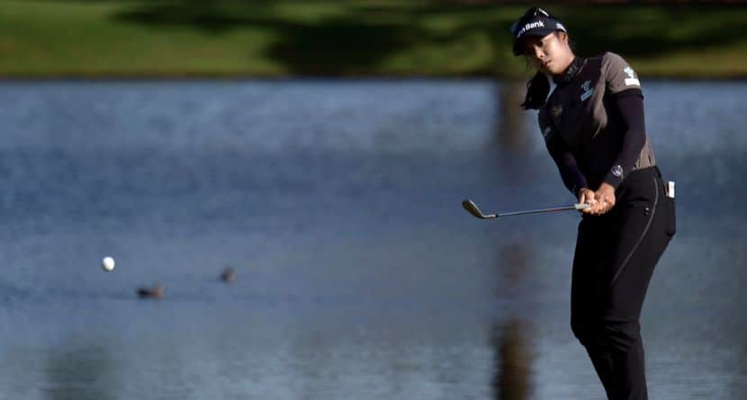 Patty Tavatanakit, of Thailand, chips to the ninth green during the first round of the LPGA Annika golf tournament at Pelican Golf Club, Thursday, Nov. 14, 2024, in Belleair, Fla. (AP Photo/Steve Nesius)