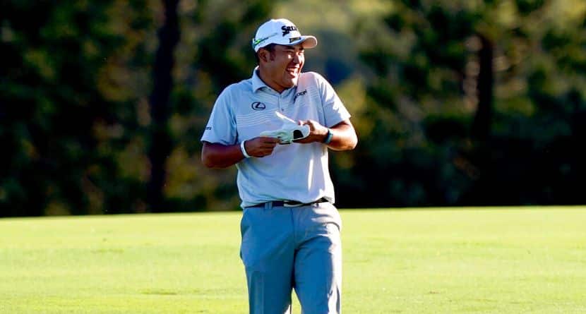 Hideki Matsuyama, of Japan, laughs as he walks up the 12th fairway during the Tournament of Champions pro-am team play golf event, Wednesday, Jan. 5, 2022, , at Kapalua Plantation Course in Kapalua, Hawaii. (AP Photo/Matt York)