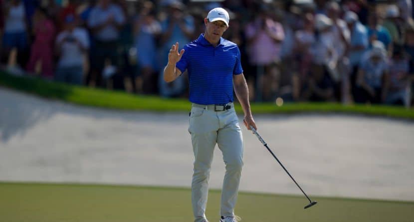 Rory McIlroy of Northern Ireland acknowledges the crowd after scoring a birdie on the 9th green in the final round of World Tour Golf Championship in Dubai, United Arab Emirates, Sunday, Nov. 17, 2024. (AP Photo/Altaf Qadri)