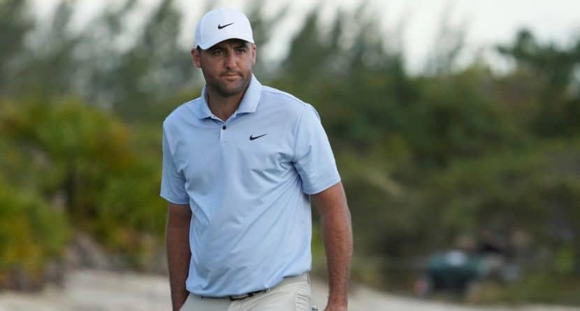 Scottie Scheffler, of the United States, reacts after missing a putt on the 18th hole during the third round of the Hero World Challenge PGA Tour at the Albany Golf Club, in New Providence, Bahamas, Saturday, Dec. 7, 2024. (AP Photo/Fernando Llano)