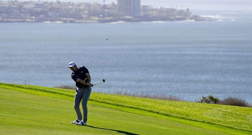 Hayden Springer hits his second shot on the fourth hole of the South Course at Torrey Pines during the second round of the Farmers Insurance Open golf tournament Thursday, Jan. 23, 2025, in San Diego. (AP Photo/Denis Poroy)