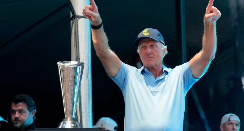 LIV Golf CEO Greg Norman waves to the crowd during an award presentation at the LIV Golf Team Championship at the Trump National Doral golf club, Oct. 22, 2023, in Doral, Fla. (AP Photo/Lynne Sladky)