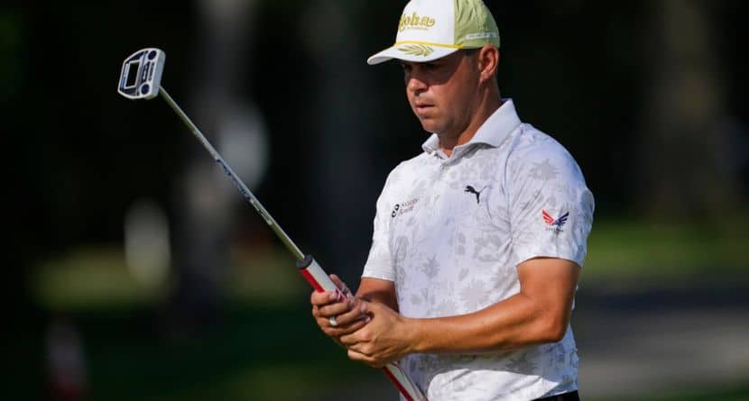 Gary Woodland lines up his shot on the ninth hole during the second round of the Sony Open golf event, Friday, Jan. 10, 2025, at Waialae Country Club in Honolulu. (AP Photo/Matt York)