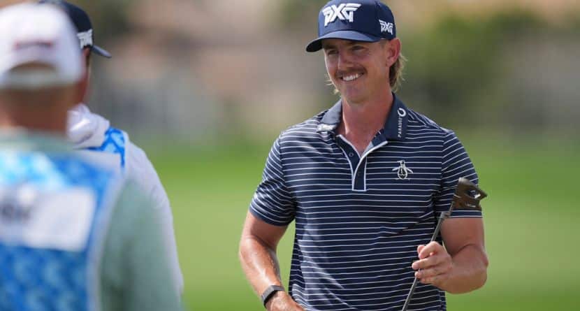 Jake Knapp smiles as he finishes with a 59 in the first round of the Cognizant Classic golf tournament, Thursday, Feb. 27, 2025, in Palm Beach Gardens, Fla. (AP Photo/Rebecca Blackwell)