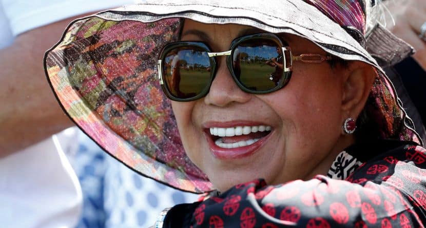 Kultida Woods, Tiger Woods' mother, watches as her son plays on the third hole during the third round of the Honda Classic golf tournament, Saturday, Feb. 24, 2018 in Palm Beach Gardens, Fla. (AP Photo/Wilfredo Lee)