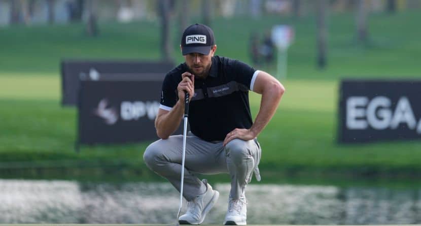 Laurie Canter of England lines up a putt on the 9th green during the second round of the Dubai Desert Classic golf tournament, in Dubai, United Arab Emirates, Friday, Jan. 17, 2025. (AP Photo/Altaf Qadri)