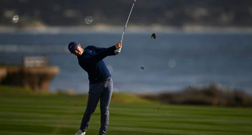 Rory McIlroy, of Northern Ireland, hits from the 18th fairway at Pebble Beach Golf Links during the final round of the AT&T Pebble Beach Pro-Am golf tournament, Sunday, Feb. 2, 2025, in Pebble Beach, Calif. (AP Photo/Nic Coury)