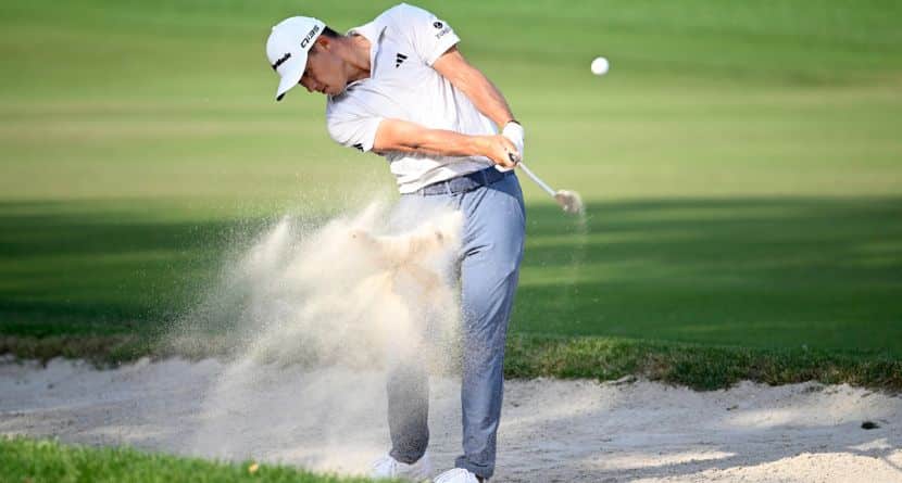 Collin Morikawa hits from a bunker alongside the 16th fairway during the final round of the Arnold Palmer Invitational at Bay Hill golf tournament, Sunday, March 9, 2025, in Orlando, Fla. (AP Photo/Phelan M. Ebenhack)