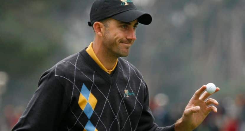 International Presidents Cup team player Geoff Ogilvy, from Australia, gestures after winning the second hole of his singles match against United States' Steve Stricker at the Presidents Cup at Harding Park Golf Course, Sunday, Oct. 11, 2009, in San Francisco. (AP Photo/Marcio Jose Sanchez)