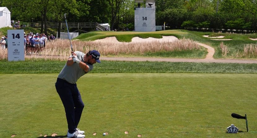 Andrew Novak hits on the 14th hole during the final round of the Truist Championship golf tournament at the Philadelphia Cricket Club, Sunday, May 11, 2025, in Flourtown. (AP Photo/Matt Rourke)