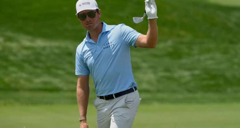 Ben Griffin reacts after sinking his shot on the 18th green during the first round of the Memorial golf tournament Thursday, May 29, 2025, in Dublin, Ohio. (AP Photo/Sue Ogrocki)