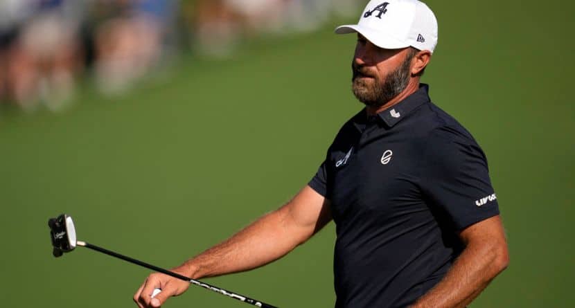 Dustin Johnson reacts after missing a putt on the second hole during the second round at the Masters golf tournament, Friday, April 11, 2025, in Augusta, Ga. (AP Photo/Ashley Landis)