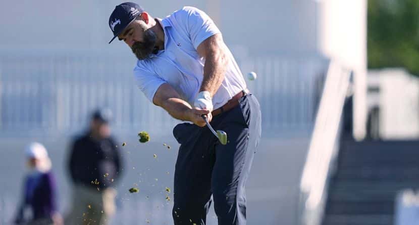 Former Philadelphia Eagles football player Jason Kelce hits on the 16th hole during a pro-am before the Truist Championship golf tournament at the Philadelphia Cricket Club, Wednesday, May 7, 2025, in Flourtown, Pa. (AP Photo/Matt Rourke)