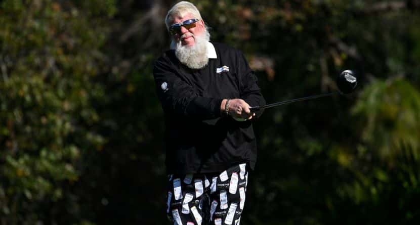 John Daly tees off on the second hole during the final round of the PNC Championship golf tournament, Sunday, Dec. 22, 2024, in Orlando, Fla. (AP Photo/Phelan M. Ebenhack)