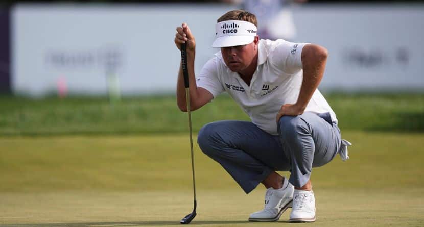 Keith Mitchell lines his putt on the ninth hole during the first round of the Truist Championship golf tournament at the Philadelphia Cricket Club, Thursday, May 8, 2025, in Flourtown, Pa. (AP Photo/Matt Rourke)