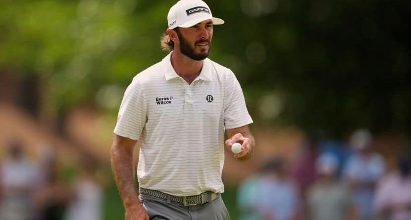 Max Homa waves after making a putt on the sixth hole during the second round of the PGA Championship golf tournament at the Quail Hollow Club, Friday, May 16, 2025, in Charlotte, N.C. (AP Photo/Matt York)