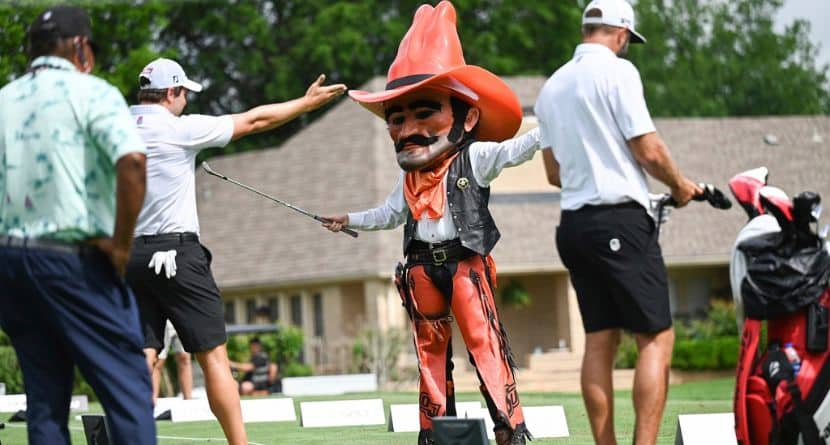 The Oklahoma State University mascot, Pistol Pete intracts with Peter Uihlein of 4Aces GC on the putting green during the pro-am ahead of LIV Golf Tulsa at the Cedar Ridge Country Club on Thursday, May. 11, 2023 in Broken Arrow, Oklahoma. (Photo by Reagan Renfroe/LIV Golf via AP)