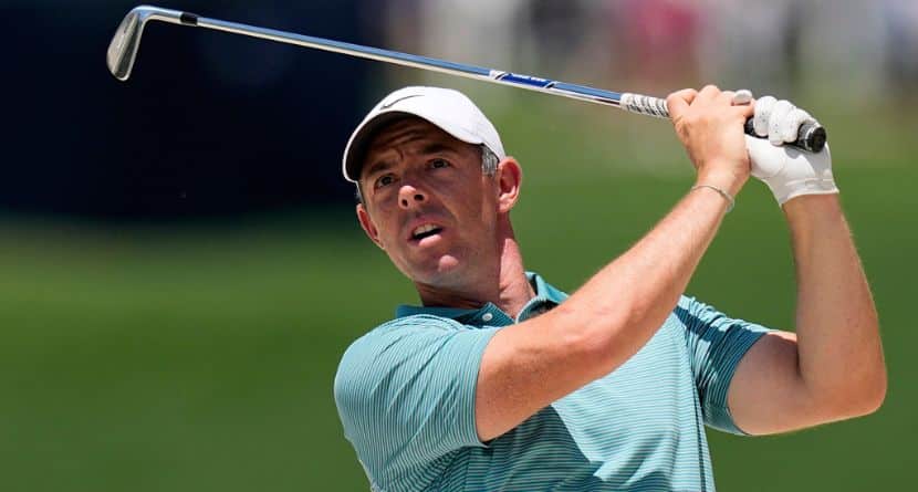 Rory McIlroy, of Northern Ireland, hits from the rough on the 10th hole during a practice round for the PGA Championship golf tournament at the Quail Hollow Club, Wednesday, May 14, 2025, in Charlotte, N.C. (AP Photo/David J. Phillip)