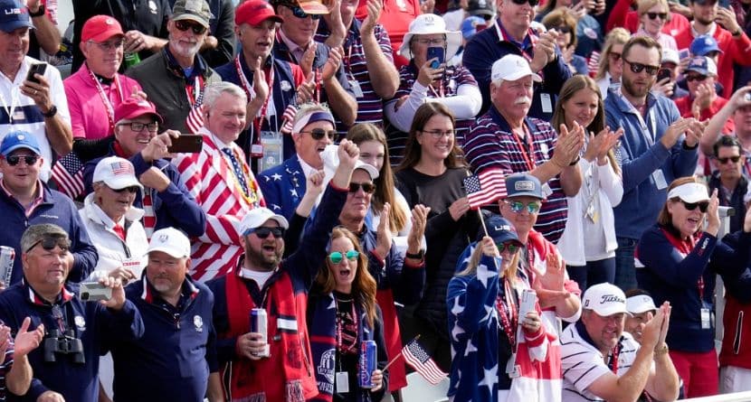 Fans cheer on the first tee during a singles match the Ryder Cup golf matches at the Whistling Straits Golf Course, Sunday, Sept. 26, 2021, in Sheboygan, Wis. (AP Photo/Ashley Landis)