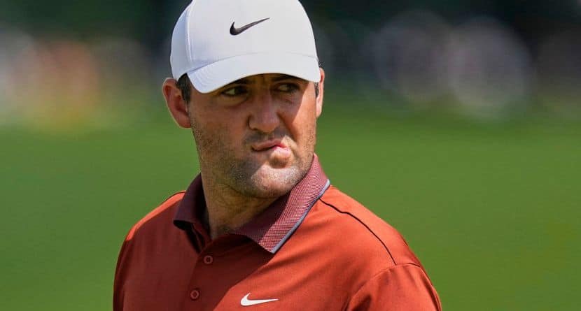 Scottie Scheffler reacts after the 16th hole during the first round of the PGA Championship golf tournament at the Quail Hollow Club, Thursday, May 15, 2025, in Charlotte, N.C. (AP Photo/David J. Phillip)