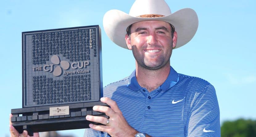 Scottie Scheffler holds the winner's trophy of the CJ Cup Byron Nelson golf tournament in McKinney, Texas, Sunday, May 4, 2025. (AP Photo/LM Otero)