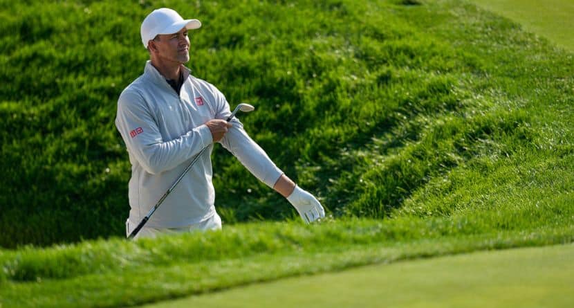 Adam Scott, of Australia, prepares to hit out of a bunker on the 13th hole during a practice round ahead of the U.S. Open golf tournament at Oakmont Country Club Wednesday, June 11, 2025, in Oakmont, Pa. (AP Photo/Seth Wenig)