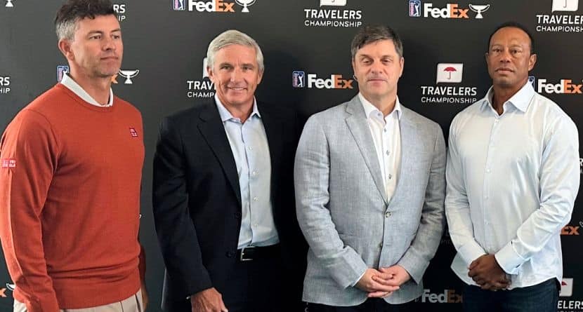 From left, Adam Scott, PGA Tour Commissioner Jay Monahan, incoming CEO Brian Rolapp, Tiger Woods at the Travelers Championship in Cromwell, Connecticut, Tuesday, June 17, 2025. (AP Photo/Doug Ferguson).