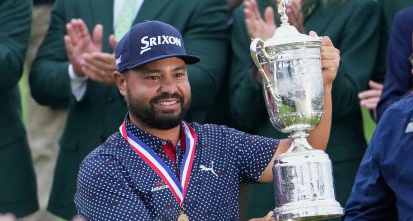 J.J. Spaun celebrates with the trophy after winning the U.S. Open golf tournament at Oakmont Country Club Sunday, June 15, 2025, in Oakmont, Pa. (AP Photo/Gene J. Puskar)