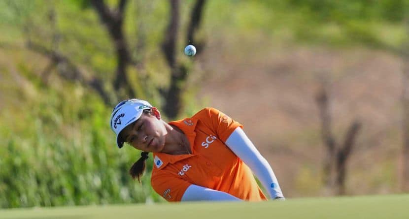 Jeeno Thitikul hits on the first hole during the first round of the Women's PGA Championship golf tournament, Thursday, June 19, 2025, in Frisco, Texas. (AP Photo/LM Otero)