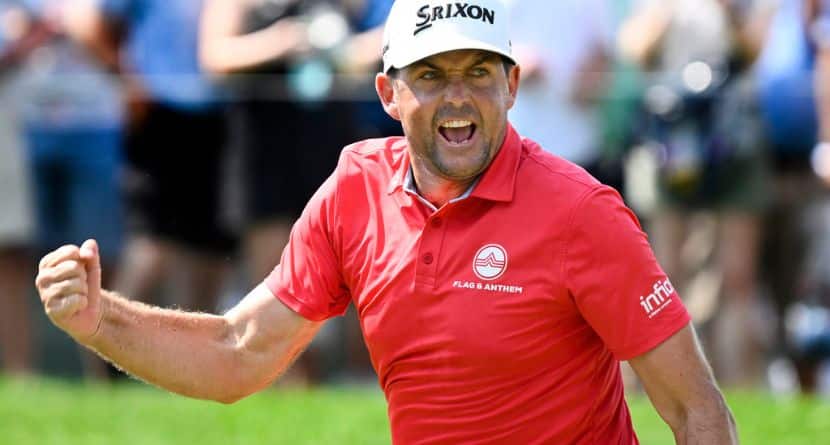 Keegan Bradley reacts to making birdie putt to a tie for the lead on the ninth hole during the final round of the Travelers Championship golf tournament at TPC River Highlands, Sunday, June 22, 2025, in Cromwell, Conn. (AP Photo/Jessica Hill)
