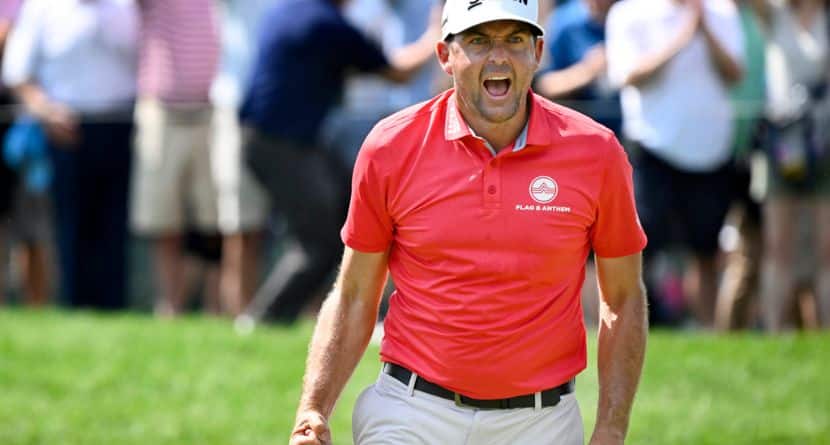 Keegan Bradley reacts to making birdie putt to a tie for the lead on the ninth hole during the final round of the Travelers Championship golf tournament at TPC River Highlands, Sunday, June 22, 2025, in Cromwell, Conn. (AP Photo/Jessica Hill)