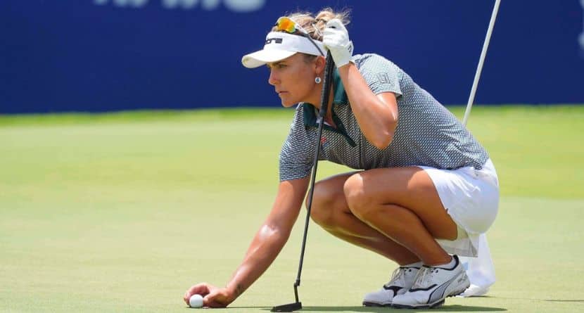 Lexi Thompson lines up a putt on the 18th hole during the second round of the Women's PGA Championship golf tournament Friday, June 20, 2025, in Frisco, Texas. (AP Photo/LM Otero)