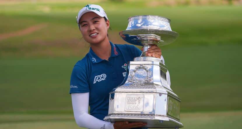 Minjee Lee poses with the trophy after winning the Women's PGA Championship golf tournament Sunday, June 22, 2025, in Frisco, Texas. (AP Photo/LM Otero)