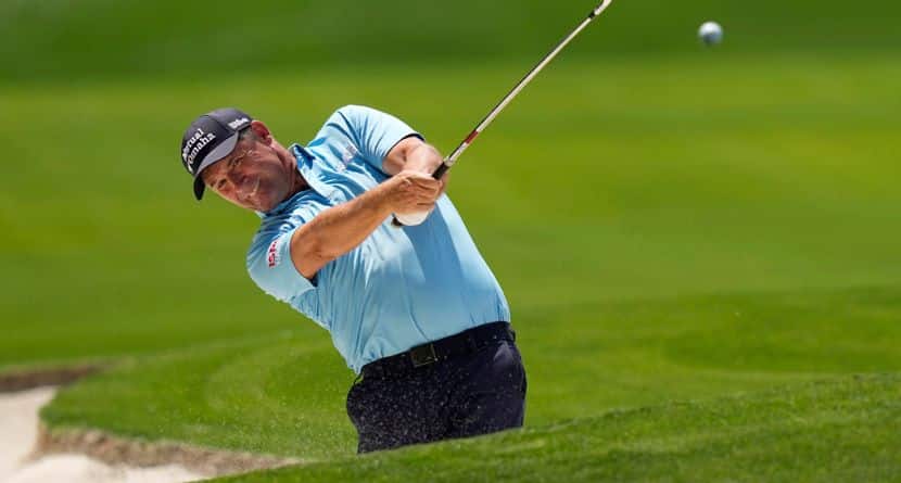 Padraig Harrington, of Ireland, hits from the bunker on the 18th hole during the first round of the PGA Championship golf tournament at the Quail Hollow Club, May 15, 2025, in Charlotte, N.C. (AP Photo/David J. Phillip)