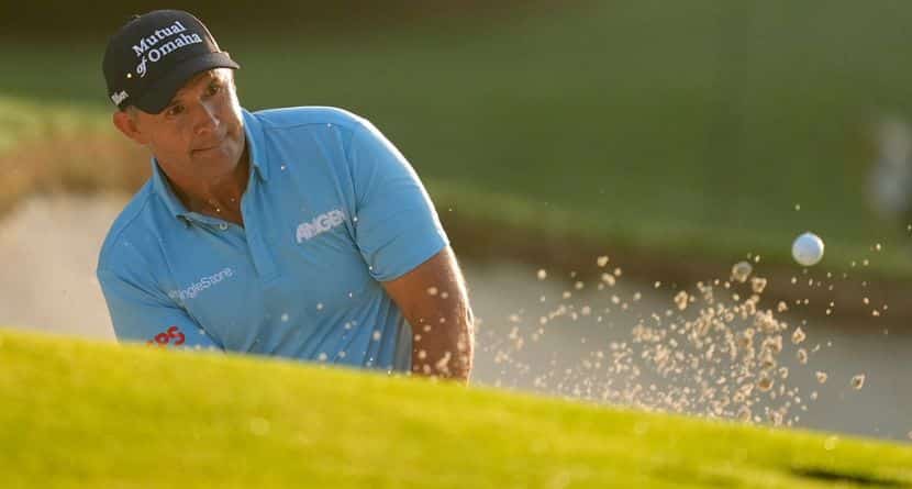 Padraig Harrington, of Ireland, hits from the bunker on the first hole during the first round of the PGA Championship golf tournament at the Quail Hollow Club, Thursday, May 15, 2025, in Charlotte, N.C. (AP Photo/George Walker IV)