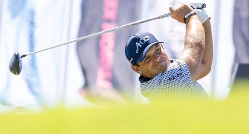 Patrick Reed, of 4Aces GC, hits from the 12th tee during the first round of LIV Golf Dallas at Maridoe Golf Club, Friday, June 27, 2025, in Carrollton, Texas. (Jon Ferrey/LIV Golf via AP)