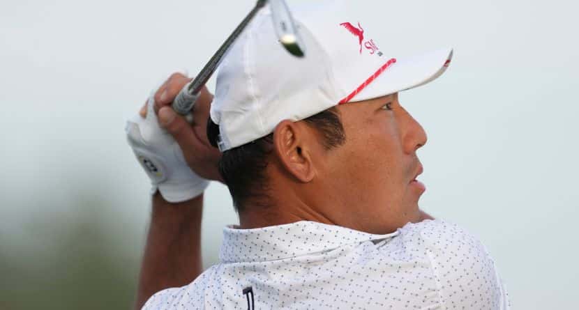 Chan Kim, of the United States, watches his shot on the 11th hole during the first round of the Mexico Open golf tournament in Puerto Vallarta, Mexico, Thursday, Feb. 20, 2025. (AP Photo/Fernando Llano)