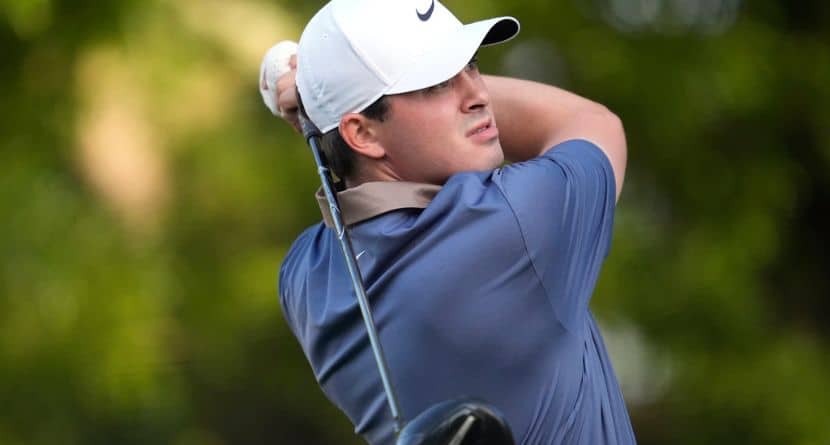 Davis Thompson watches his tee shot on the second hole during the first round of the PGA Championship golf tournament at the Quail Hollow Club, Thursday, May 15, 2025, in Charlotte, N.C. (AP Photo/George Walker IV)