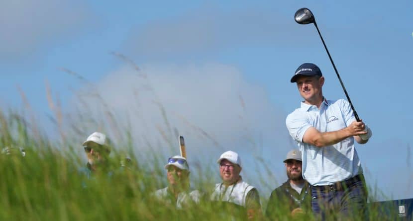 Justin Rose of England plays his tee shot off the 2nd hole during a practice round for the British Open golf championship at the Royal Portrush Golf Club, Northern Ireland, Wednesday, July 16, 2025. (AP Photo/Jon Super)