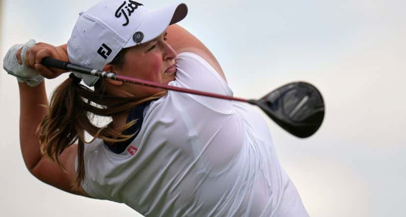 Lottie Woad, of England, hits from the third tee during the first round of the U.S. Women's Open golf tournament at Erin Hills, May 29, 2025, in Erin, Wis. (AP Photo/Jeff Roberson)