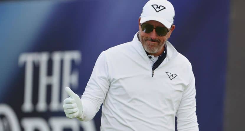 Phil Mickelson of the United States acknowledges the crowd as he walks off the 1st tee after playing his shot during the first round of the British Open golf championship at the Royal Portrush Golf Club, Northern Ireland, Thursday, July 17, 2025. (AP Photo/Peter Morrison)