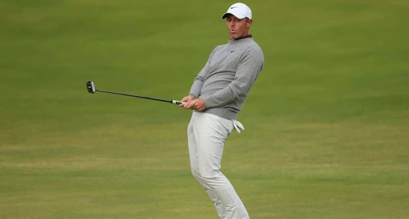 Rory McIlroy of Northern Ireland reacts after putting on the 18th green during the first round of the British Open golf championship at the Royal Portrush Golf Club, Northern Ireland, Thursday, July 17, 2025. (AP Photo/Peter Morrison)
