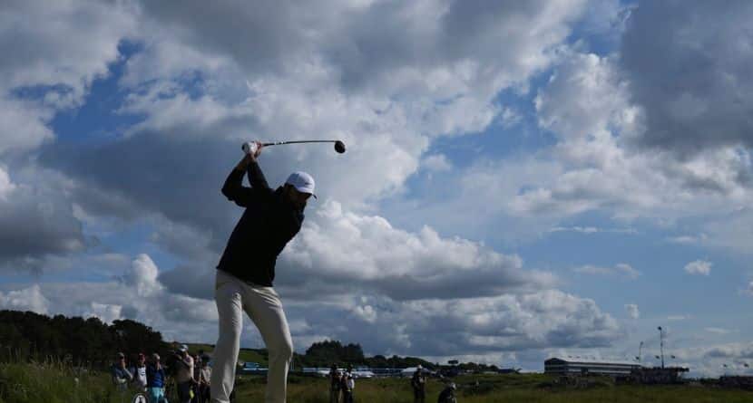 Scottie Scheffler of the United States plays off the 9th tee during the third round of the British Open golf championship at the Royal Portrush Golf Club, Northern Ireland, Saturday, July 19, 2025. (AP Photo/Jon Super)